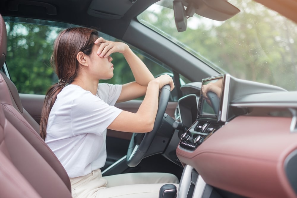 Visibly Upset Woman Behind The Wheel