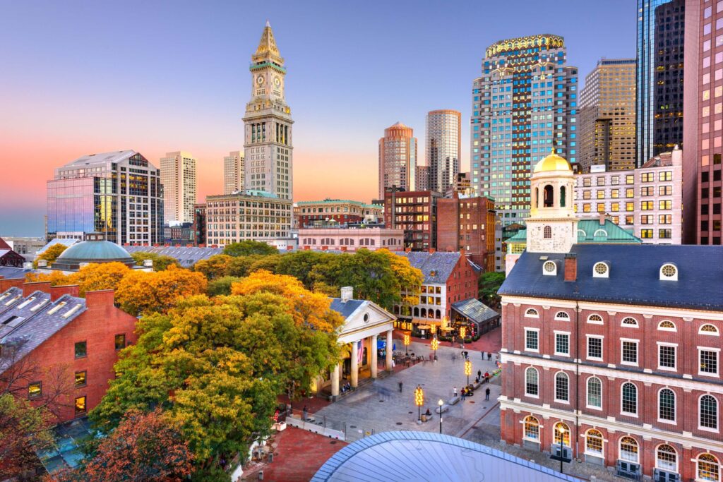 Boston, Massachusetts, USA with Faneuil Hall and Quincy Market at dusk.