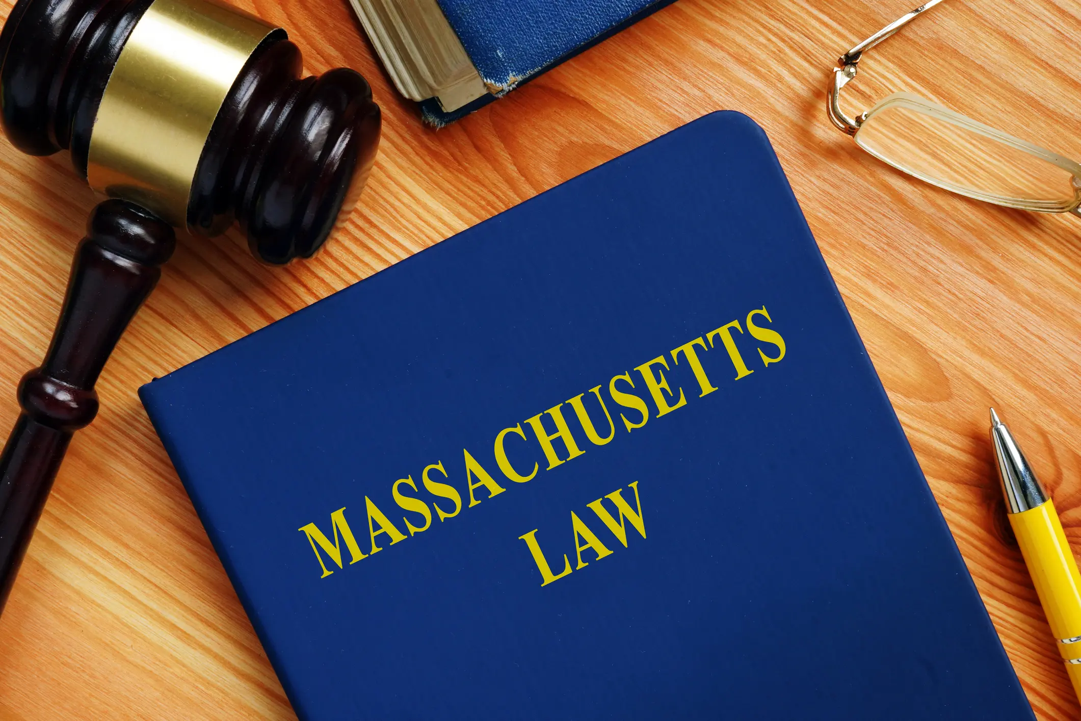 State Massachusetts law on the table in the court.