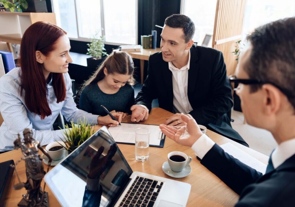 Family meeting with lawyer in office.