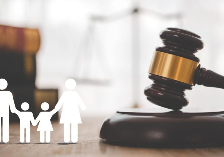 Gavel and family icons with law books.